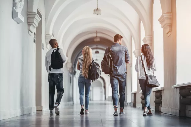 Students walking down hall 